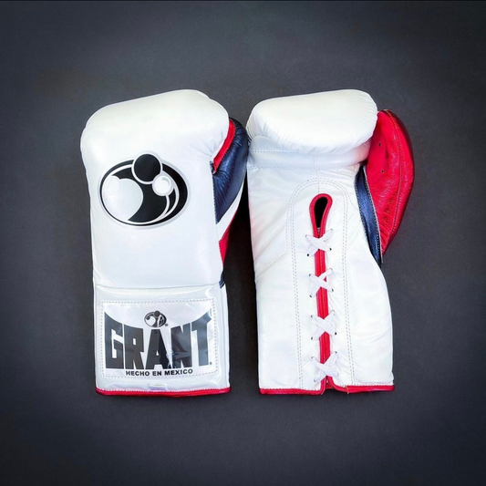 Customize your GRANT boxing gloves for the perfect gift! High-quality replica gloves, ideal for sparring and long training sessions. Features professional-grade construction, perfect fit, enhanced impact protection, ventilation technology, and secure closure. Available in various sizes and colors. Suitable for all levels of training and competition.