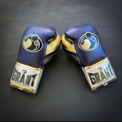 Customize your GRANT boxing gloves for the perfect gift! High-quality replica gloves, ideal for sparring and long training sessions. Features professional-grade construction, perfect fit, enhanced impact protection, ventilation technology, and secure closure. Available in various sizes and colors. Suitable for all levels of training and competition.