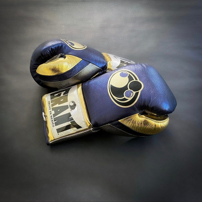 Customize your GRANT boxing gloves for the perfect gift! High-quality replica gloves, ideal for sparring and long training sessions. Features professional-grade construction, perfect fit, enhanced impact protection, ventilation technology, and secure closure. Available in various sizes and colors. Suitable for all levels of training and competition.