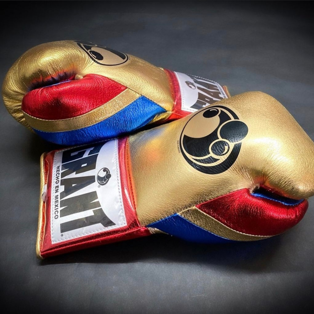 Customize your GRANT boxing gloves for the perfect gift! High-quality replica gloves, ideal for sparring and long training sessions. Features professional-grade construction, perfect fit, enhanced impact protection, ventilation technology, and secure closure. Available in various sizes and colors. Suitable for all levels of training and competition.