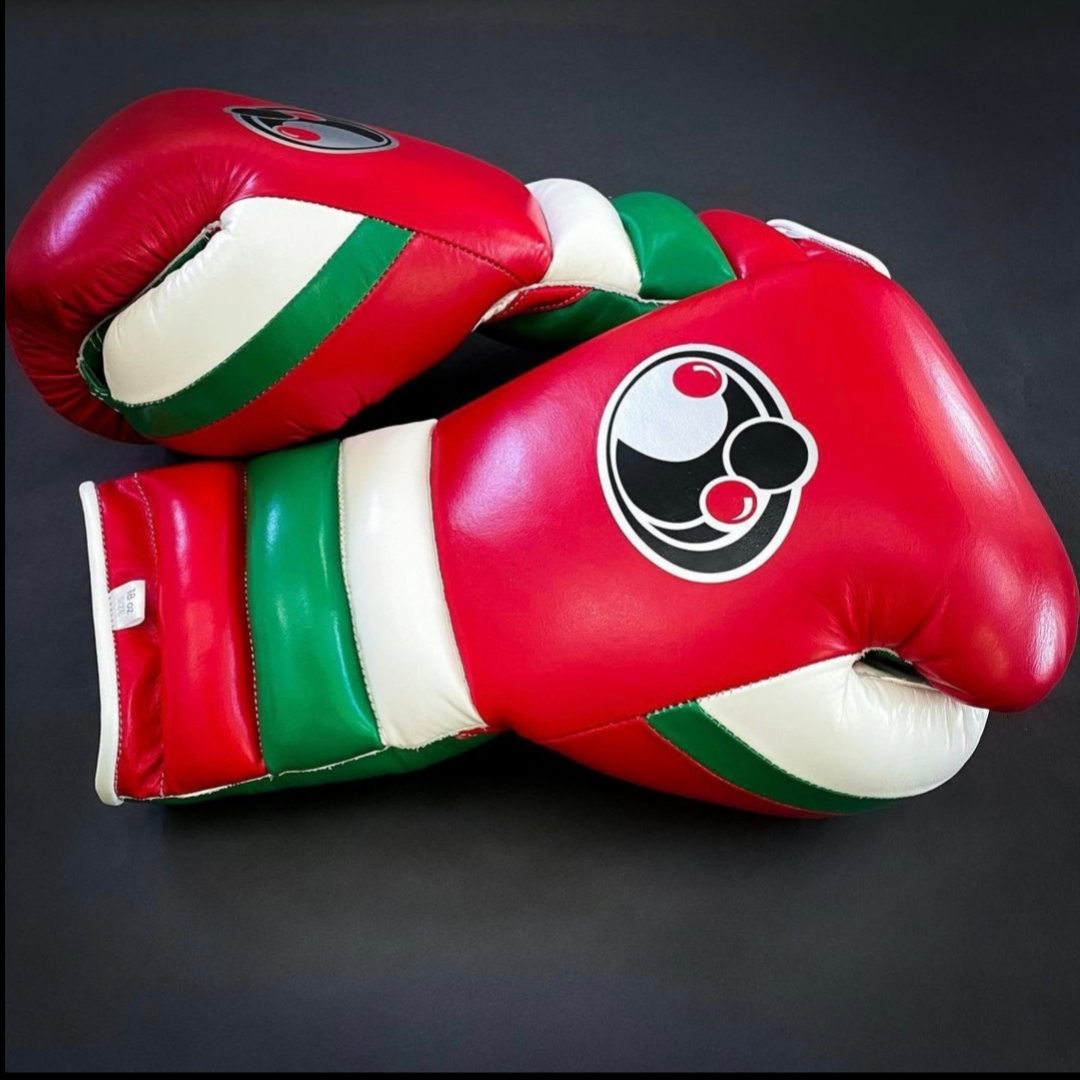 Customize your GRANT boxing gloves for the perfect gift! High-quality replica gloves, ideal for sparring and long training sessions. Features professional-grade construction, perfect fit, enhanced impact protection, ventilation technology, and secure closure. Available in various sizes and colors. Suitable for all levels of training and competition.