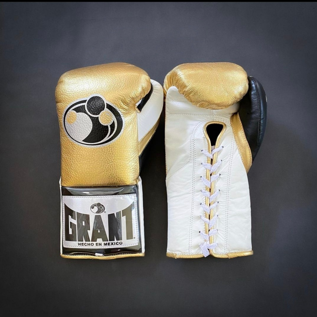 Customize your GRANT boxing gloves for the perfect gift! High-quality replica gloves, ideal for sparring and long training sessions. Features professional-grade construction, perfect fit, enhanced impact protection, ventilation technology, and secure closure. Available in various sizes and colors. Suitable for all levels of training and competition.