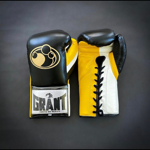 Customize your GRANT boxing gloves for the perfect gift! High-quality replica gloves, ideal for sparring and long training sessions. Features professional-grade construction, perfect fit, enhanced impact protection, ventilation technology, and secure closure. Available in various sizes and colors. Suitable for all levels of training and competition.