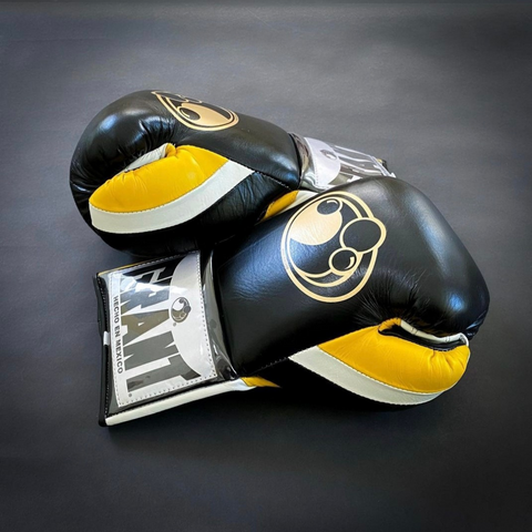 Customize your GRANT boxing gloves for the perfect gift! High-quality replica gloves, ideal for sparring and long training sessions. Features professional-grade construction, perfect fit, enhanced impact protection, ventilation technology, and secure closure. Available in various sizes and colors. Suitable for all levels of training and competition.