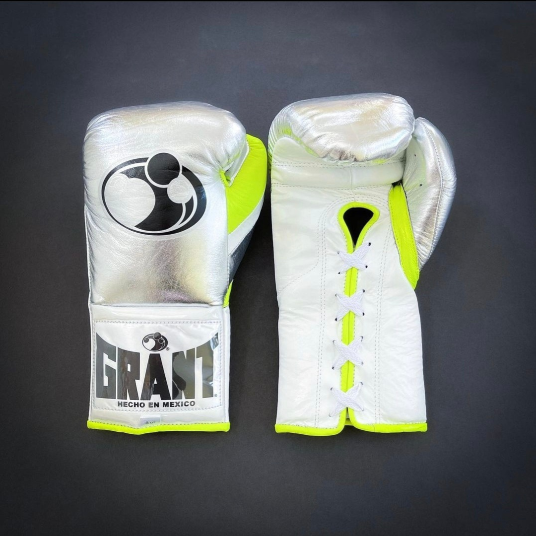 Customize your GRANT boxing gloves for the perfect gift! High-quality replica gloves, ideal for sparring and long training sessions. Features professional-grade construction, perfect fit, enhanced impact protection, ventilation technology, and secure closure. Available in various sizes and colors. Suitable for all levels of training and competition.